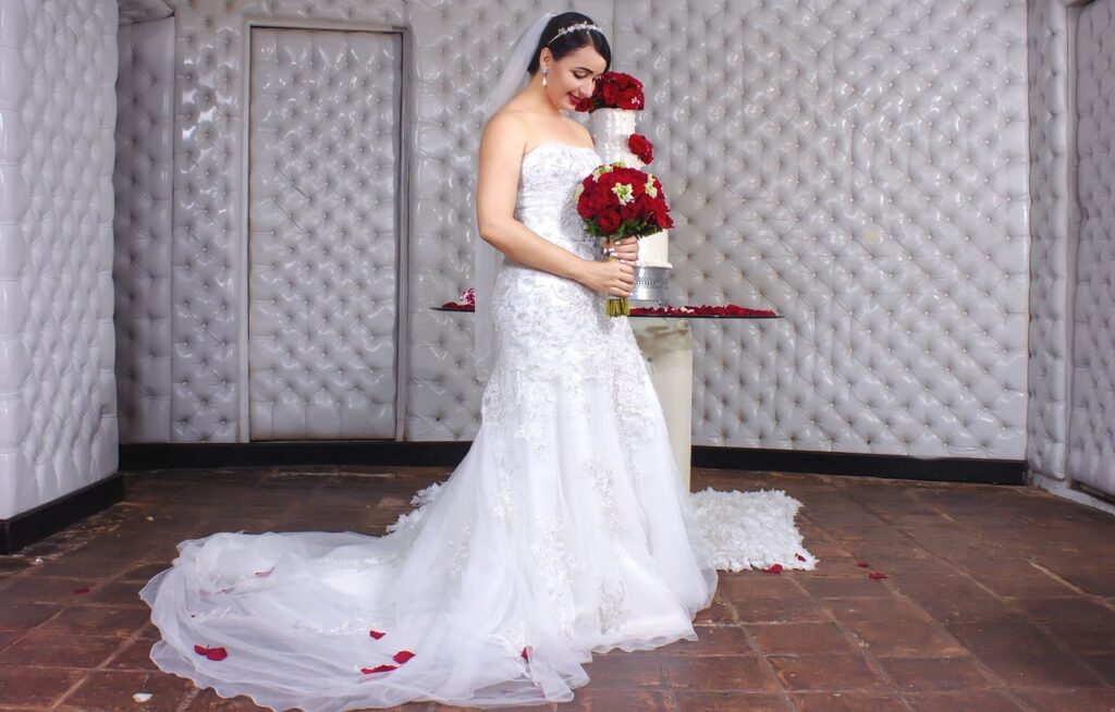 Admiring the wedding dress